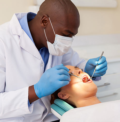 dentist examining patient